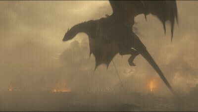 A Dragon Is Flying Over A Burning City In The Fog GIF