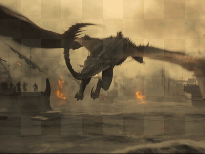 A Dragon Is Flying Over A Burning City With A Few People Standing In The Background GIF