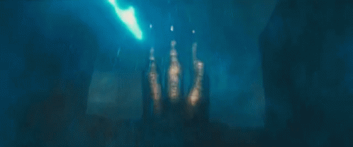 A Dragon Is Flying Over A City With A Sign That Says ' A ' On It GIF