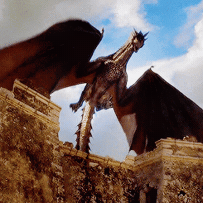 A Dragon Is Flying Over A Stone Wall In The Sky GIF