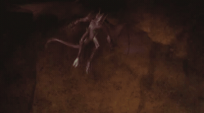 A Dragon Is Flying Through The Air With A Green Light Coming From Its Mouth . GIF