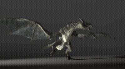 A Dragon Is Flying Through The Air With Its Wings Spread GIF