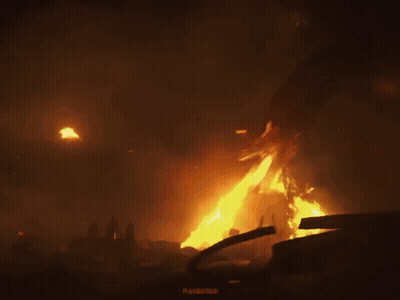 A Dragon Is Surrounded By Flames And A Sign That Says " Ravaging " GIF