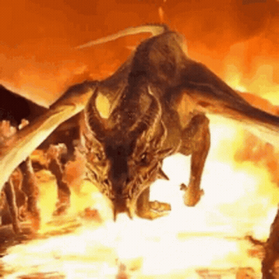 A Dragon With Wings Is Flying Through The Air In Front Of A Fire . GIF