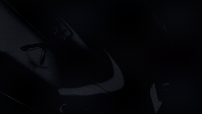 A Drawing Of A Blue Car With The Letter L On The Front GIF