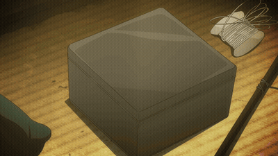 A Drawing Of A Box With A Spool Of Thread On It GIF