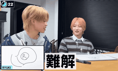 A Drawing Of A Circle With A R On It Is Being Shown By A Person Named Ryuki GIF