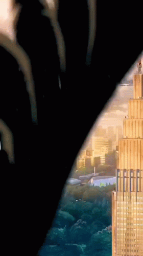 A Drawing Of A City And A Tower With The Letter E On The Top GIF