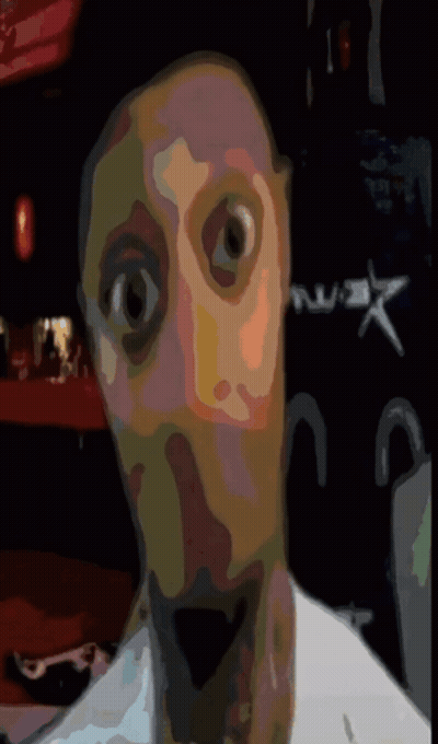 A Drawing Of A Man 'S Face With A Star In The Background GIF