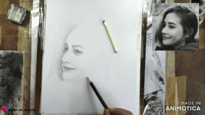 A Drawing Of A Woman 'S Face Is Made By Animatica GIF