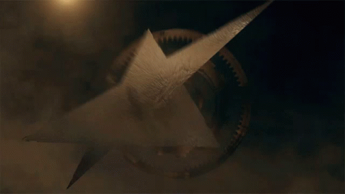 A Drawing Of An Arrow Pointing To A Gear In The Dark GIF