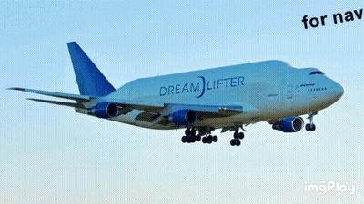 A Dream Lifter Plane Is Taking Off From An Airport Runway GIF