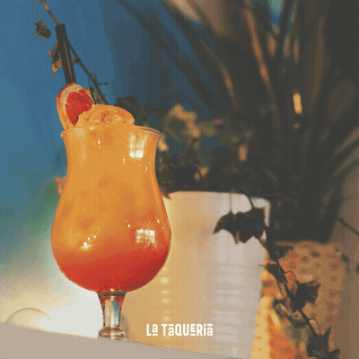 A Drink In A Glass With La Taqueria Written On It GIF