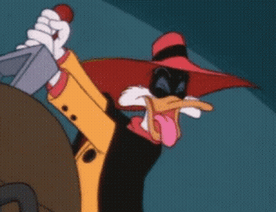 A Duck In A Red Hat Is Holding A Knife In His Hand . GIF