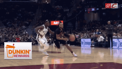 A Dunkin ' Rewards Ad Is Displayed On The Basketball Court GIF