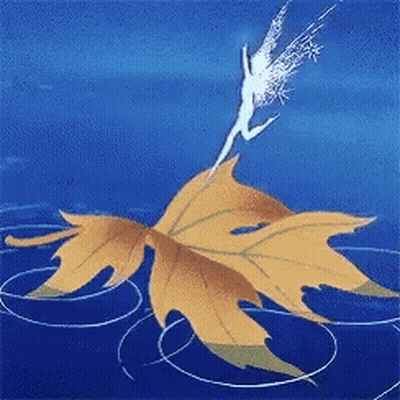 A Fairy Is Flying Over A Maple Leaf GIF