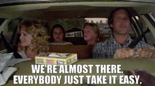 A Family Is Sitting In A Car With The Words " We 'Re Almost There Everybody Just Take It Easy " GIF