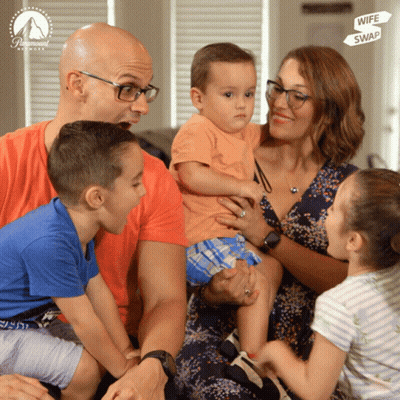 A Family Sitting On A Couch With A Paramount Logo On The Bottom GIF