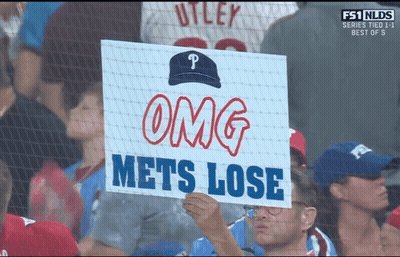 A Fan Holds A Sign That Says Omg Mets Lose GIF