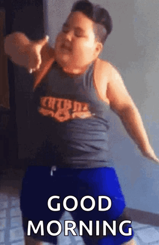A Fat Boy Is Dancing In A Room With The Words `` Good Morning '' Written On The Bottom . GIF