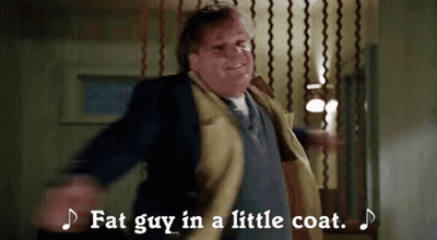A Fat Guy In A Little Coat Is Dancing In A Room . GIF