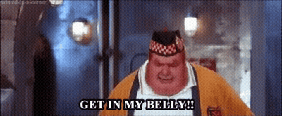 A Fat Man Wearing A Hat And A Sweater Is Saying `` Get In My Belly '' . GIF