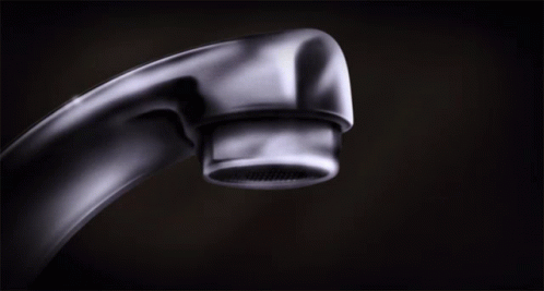 A Faucet With Water Dripping Out Of It GIF