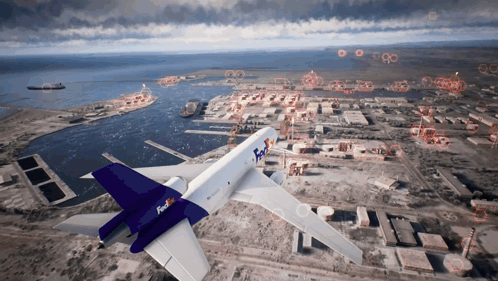 A Fedex Plane Is Flying Over A City With A Large Body Of Water In The Background GIF