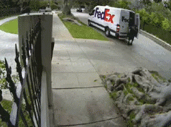 A Fedex Van Is Parked On The Side Of A Street GIF