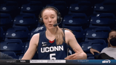 A Female Basketball Player From Uconn Is Wearing Headphones GIF