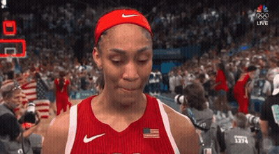 A Female Basketball Player Is Crying While Wearing A Nike Headband GIF