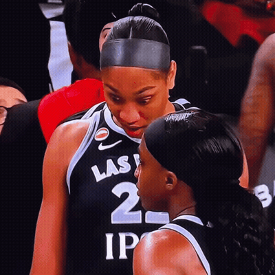 A Female Basketball Player Wearing A Black Jersey With Las Vegas On It GIF