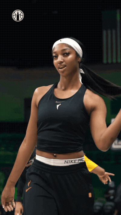A Female Basketball Player Wearing A Black Nike Pro Tank Top GIF