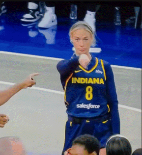 A Female Basketball Player Wearing A Blue Indiana 8 Jersey GIF