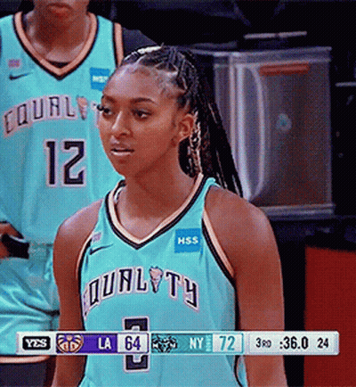 A Female Basketball Player Wearing A Blue Jersey That Says Equality GIF