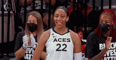 A Female Basketball Player Wearing A Jersey That Says Aces 22 GIF