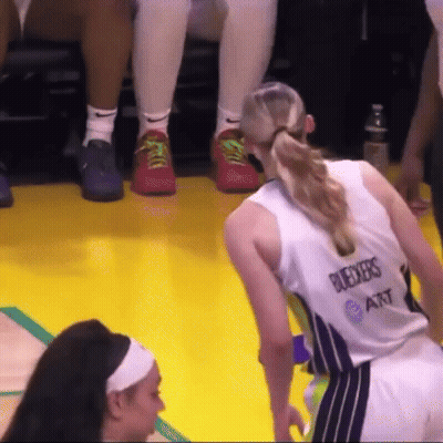 A Female Basketball Player Wearing A Jersey That Says Bugeyes GIF