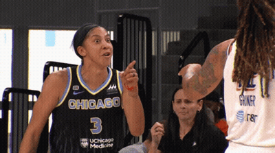 A Female Basketball Player Wearing A Jersey That Says Chicago 3 GIF