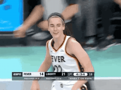 A Female Basketball Player Wearing A Jersey That Says Fever GIF