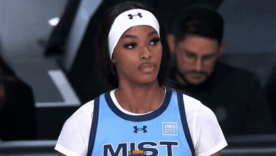 A Female Basketball Player Wearing A Jersey That Says Mist On It GIF