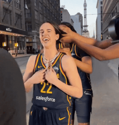 A Female Basketball Player Wearing A Jersey That Says Salesforce On It GIF