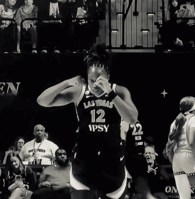 A Female Basketball Player Wearing A Las Vegas Number 12 Jersey GIF