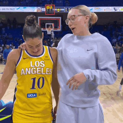 A Female Basketball Player Wearing A Los Angeles Number 10 Jersey GIF