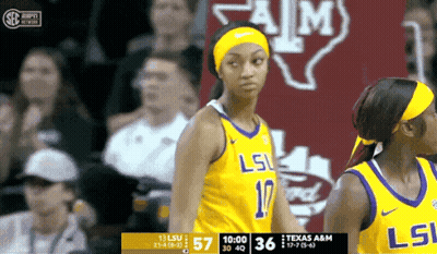 A Female Basketball Player Wearing A Lsu Jersey Stands On The Court GIF