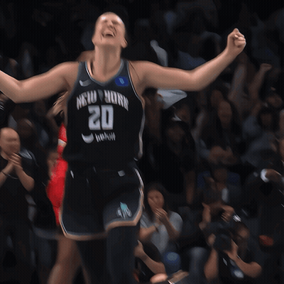 A Female Basketball Player Wearing A New York Jersey GIF