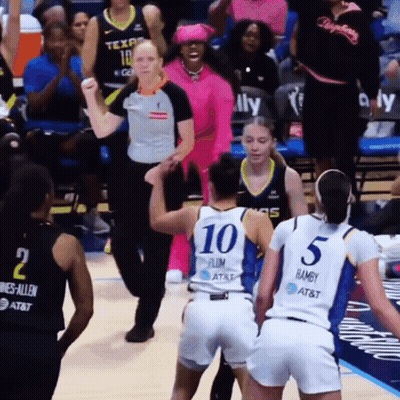 A Female Basketball Player Wearing A Number 10 Jersey GIF