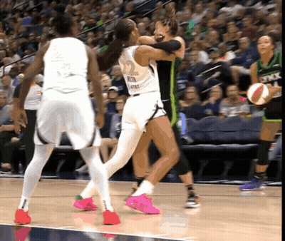 A Female Basketball Player Wearing A Number 22 Jersey GIF