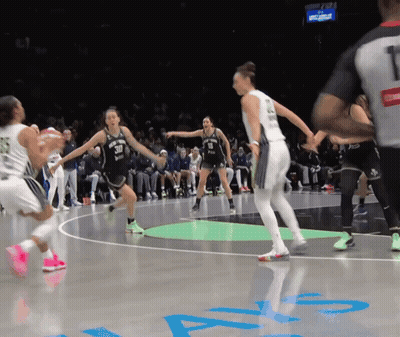 A Female Basketball Player Wearing A Number 30 Jersey GIF