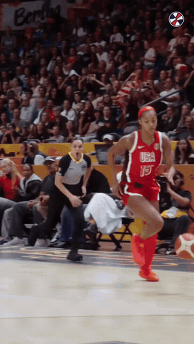 A Female Basketball Player Wearing A Red Usa Jersey GIF