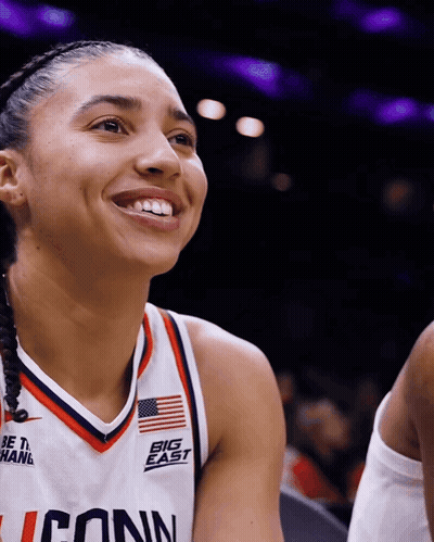 A Female Basketball Player Wears A Jersey That Says Big East GIF